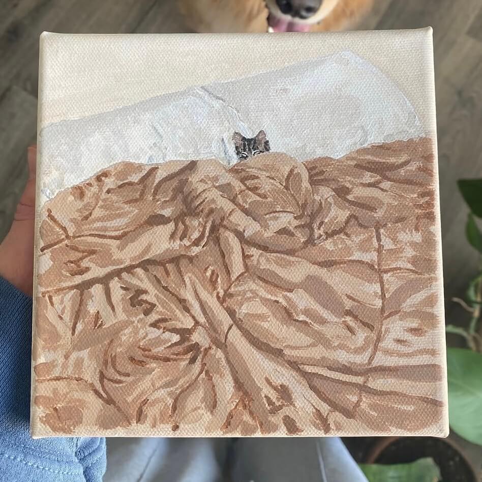 Painting of a cat sleeping beneath blankets